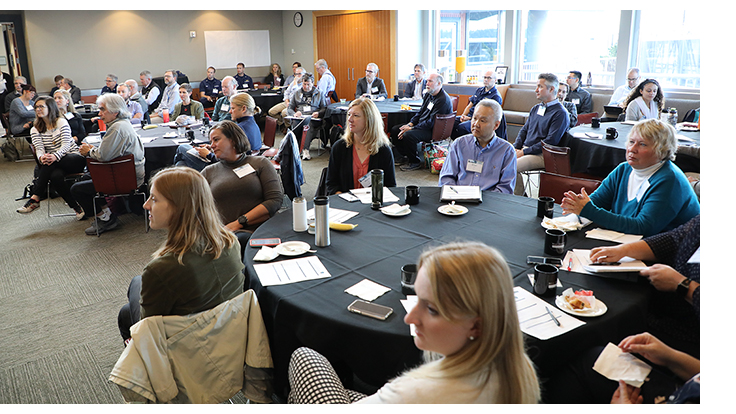 Participants listen at the October 3 meeting of a workshop