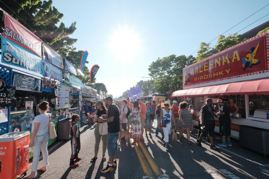 People visiting vendors at the Ballard SeafoodFest