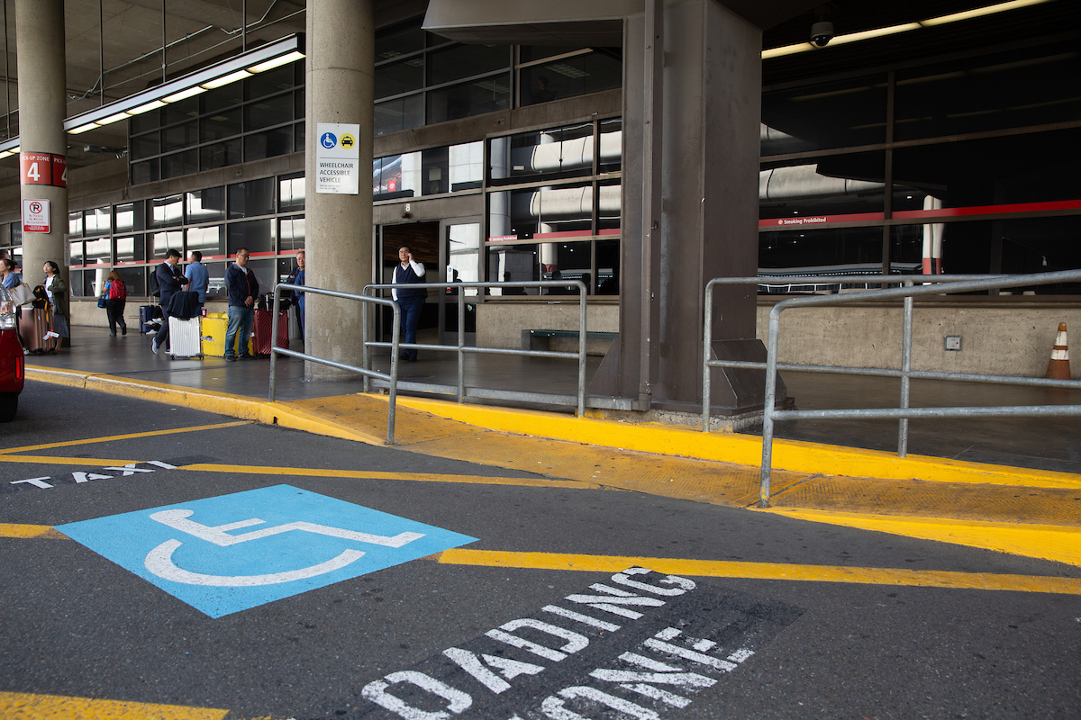 Taxi wheelchair loading zone on airport drive