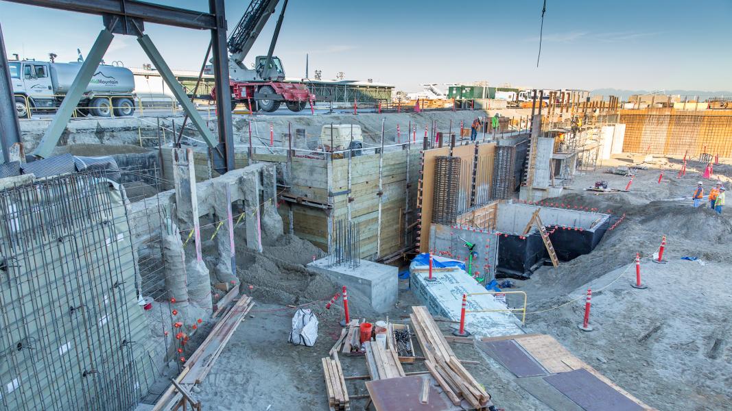 North Satellite construction site - pit with structural columns going in