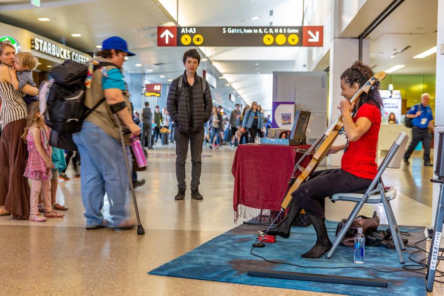 Musician playing in the terminal at Sea-Tac