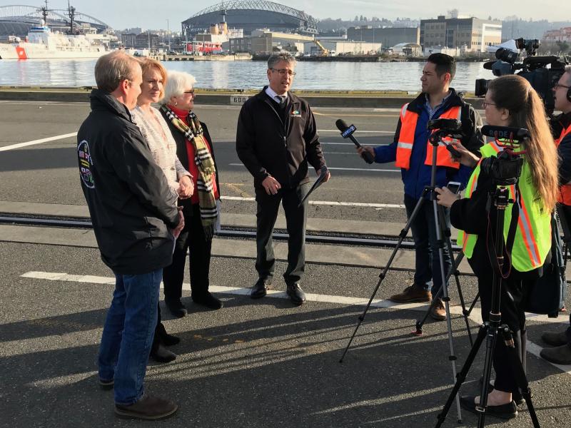 Comissioner Felleman and others with the media