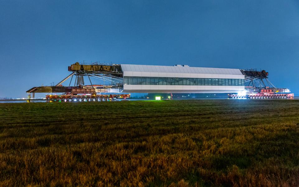 Center span of IAF pedestrian walkway moving down the center runway