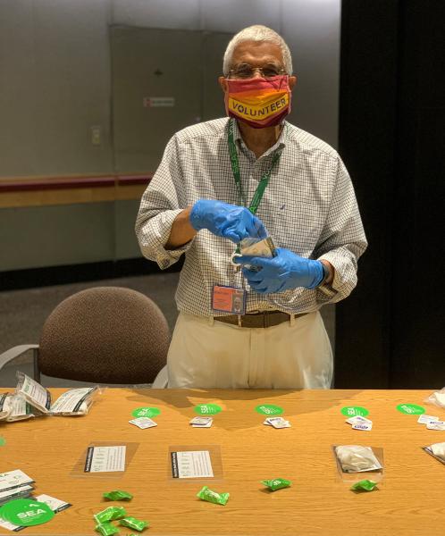 SEA volunteer Mohan puts together care kits