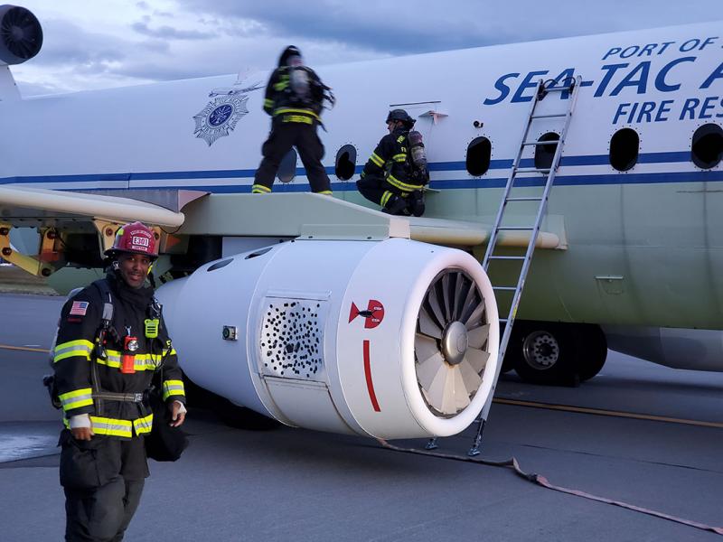 firefighter on aircraft mock up