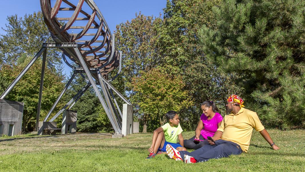 Family enjoying the sun at həʔapus Village Park, Duwamish River, Seattle, Sept. 2016, 