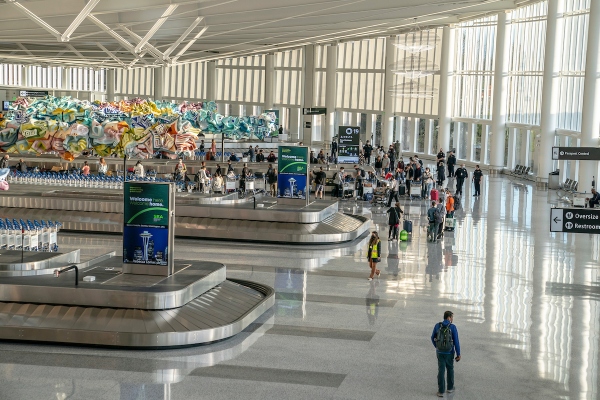 Baggage claim in the IAF Grand Hall at SEA Airport