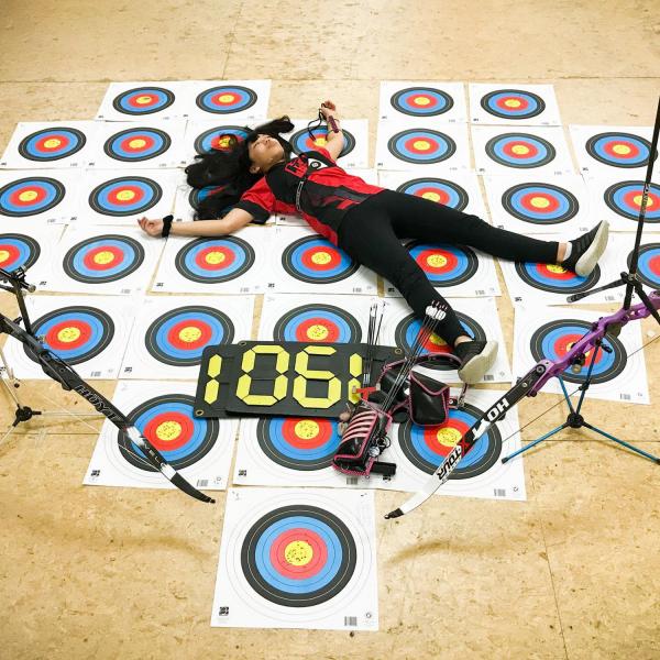 Gabi posing with targets.