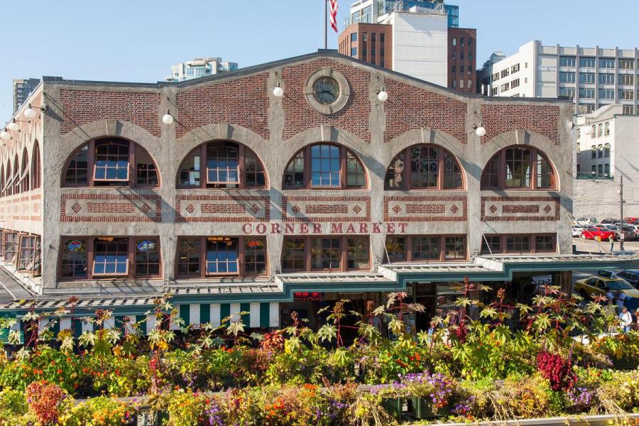 Pike Place market building with flowers