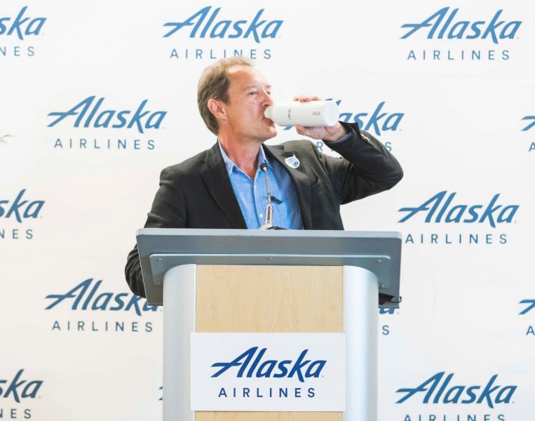 Commissioner Steinbrueck drinks out of a refillable bottle at SEA